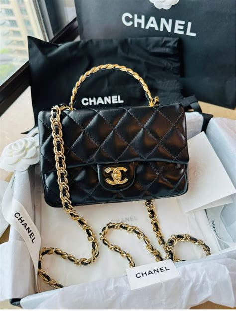 chanel 23s mini cf|Chanel mini flap bag with top handle.